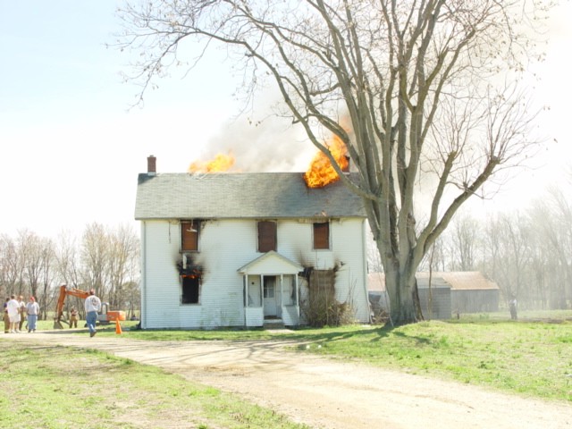 Flames through the vent holes.