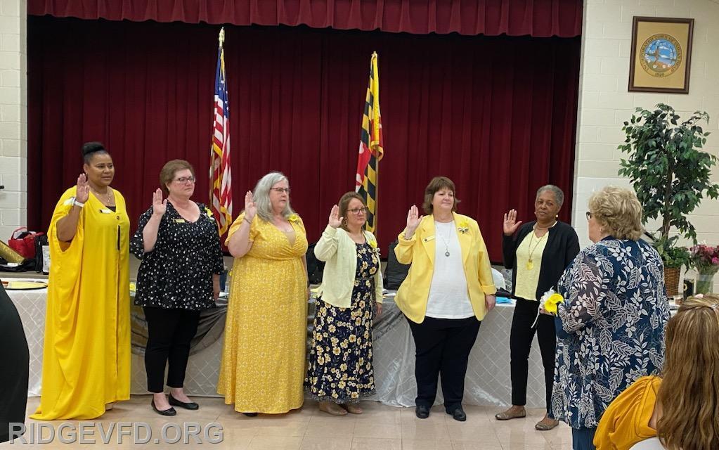 Becky Wathen (5th from left) being sworn in as LA-SMVFA Treasure.