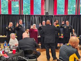 Past President Charlie Bradburn (2nd from left) being sworn in as SMVFA Treasurer